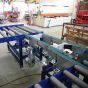 Light duty roller conveyors with plastic support rollers
